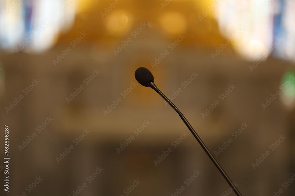 Microphone in concert hall or conference room soft and blur style for background. Microphone in concert hall or conference room soft and blur style for background.