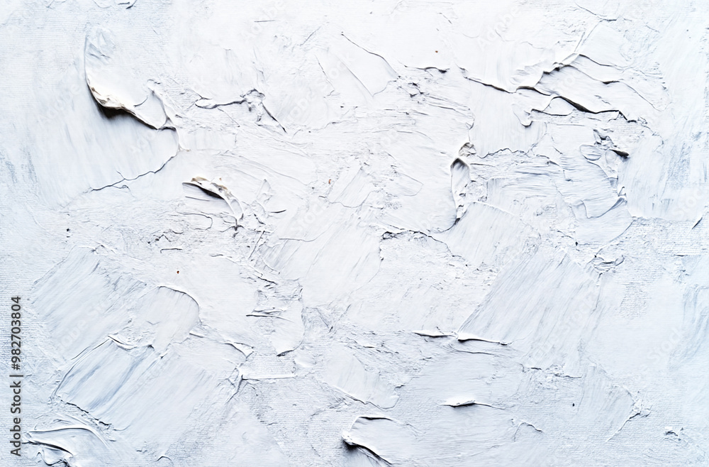 A textured white plaster wall with visible brushstrokes and uneven surface patterns. A textured white plaster wall with visible brushstrokes and uneven surface patterns.