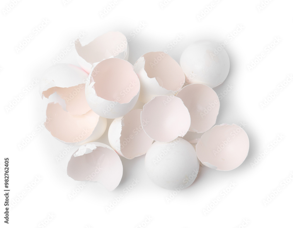 Pile of broken eggshells isolated on white, top view Pile of broken eggshells isolated on white, top view
