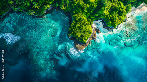 Fototapeta Naklejka Na Ścianę i Meble -  top view of beautiful tropical island with dense trees, with white sand beach and clear blue waters. concept of vacation with family. 4K Island Wallpaper