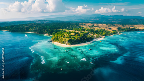 Fototapeta Naklejka Na Ścianę i Meble -  top view of beautiful tropical island with dense trees, with white sand beach and clear blue waters. concept of vacation with family. 4K Island Wallpaper
