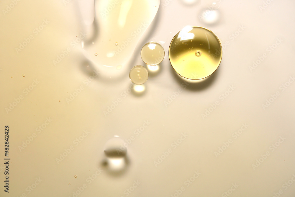 Drops of oil are on the surface of the water. Drops of oil are on the surface of the water.