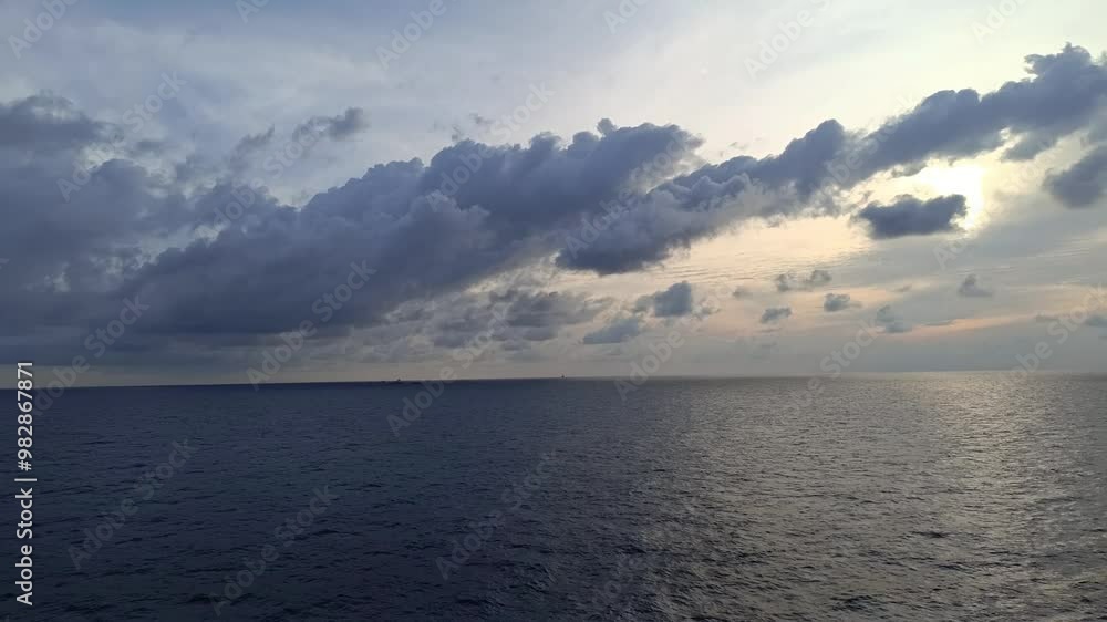 Sunrise over the sea with cumulus clouds. Sunrise over the sea with cumulus clouds.