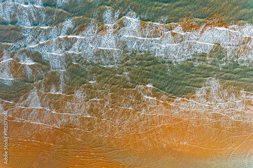 Blue sea waves and sand aerial photograph photo