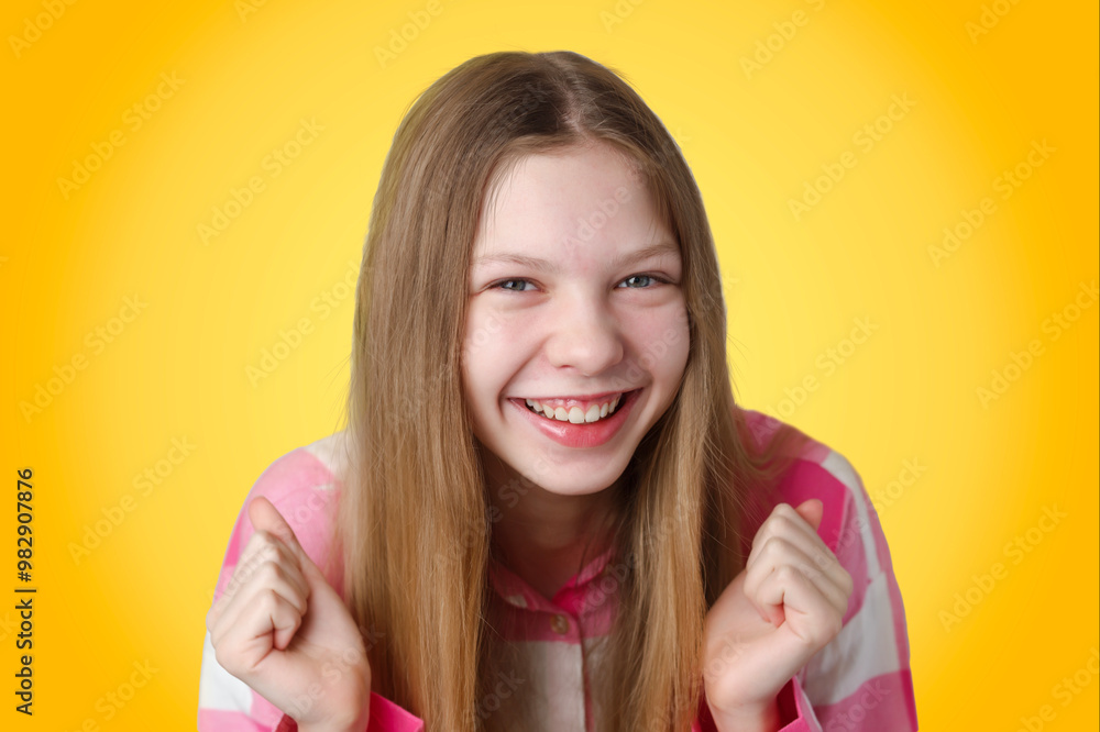 children's emotions portrait of a happy blonde girl in a pink shirt and laughing children's emotions portrait of a happy blonde girl in a pink shirt and laughing