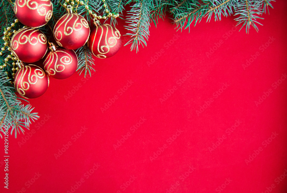 Christmas decorations on red background, flat lay. Space for text. Christmas decorations on red background, flat lay. Space for text.