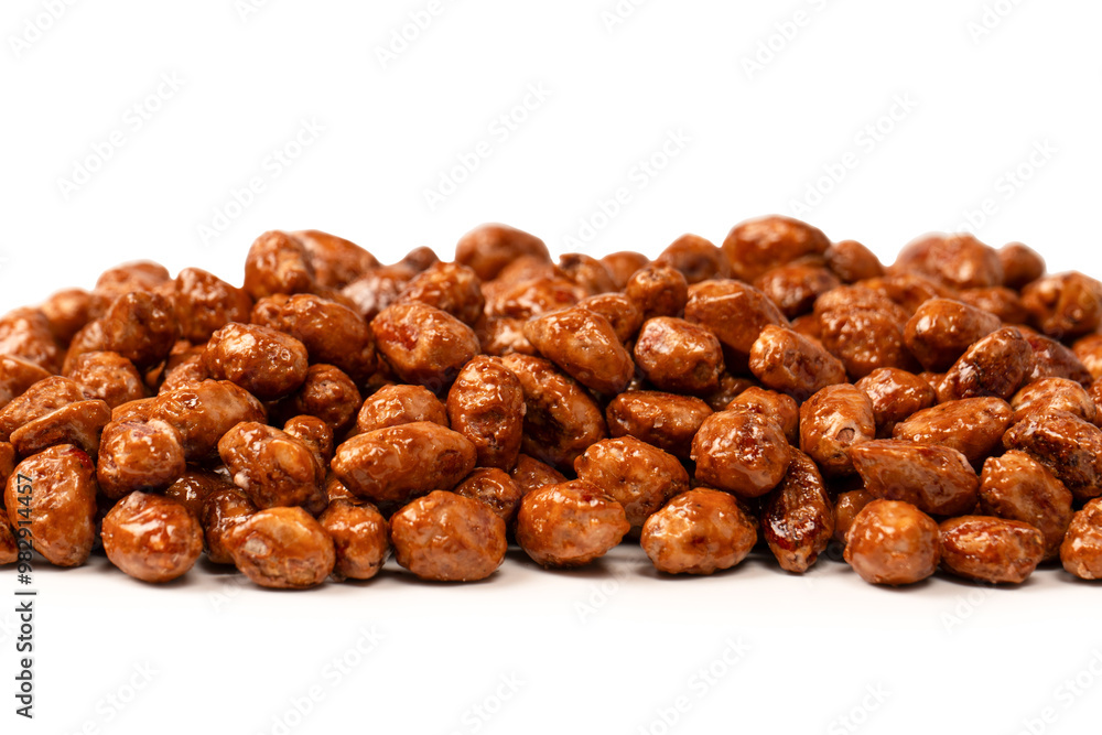 Tasty sweet roasted peanuts isolated on a white background. Tasty sweet roasted peanuts isolated on a white background.