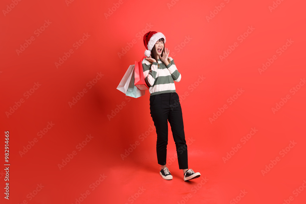 Woman wearing Santa hat Woman wearing Santa hat
