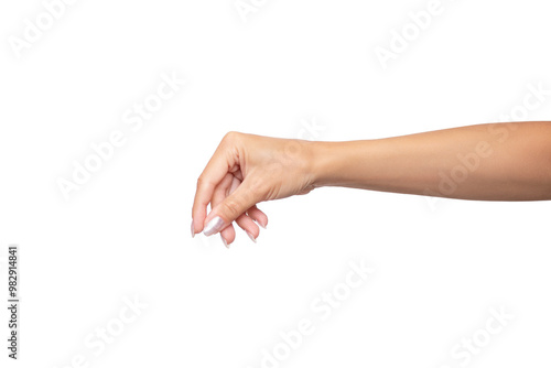 Female hand holding something between fingers. Gesture isolated on white background. Girl holding some object, pinch of salt or pepper. Product presentation concept or mockup with copy space