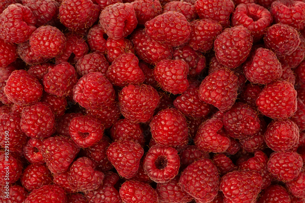 Tasty fresh raspberry as a background. Tasty fresh raspberry as a background.