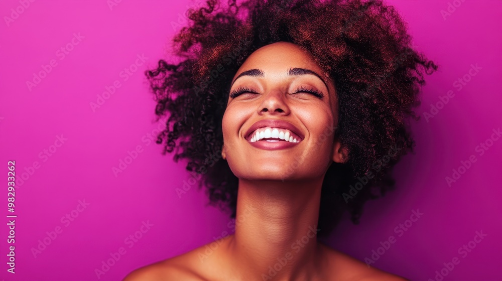 Joyful woman with curly hair against pink backdrop Joyful woman with curly hair against pink backdrop