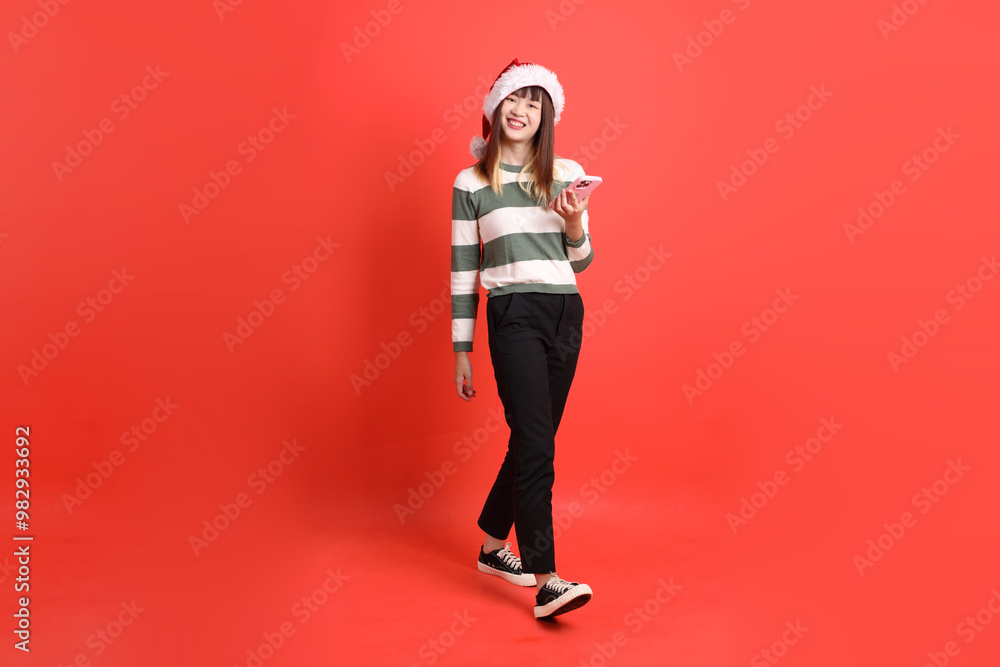 Woman wearing Santa hat Woman wearing Santa hat