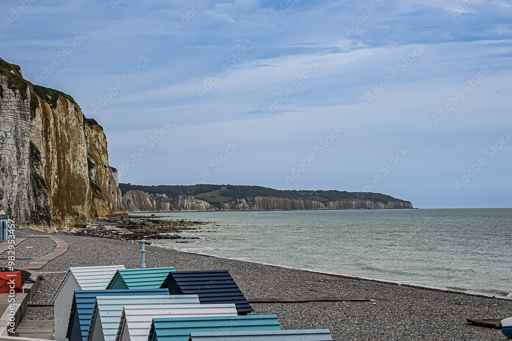 Pebble Beach, bathing boxes and cliffs in Dieppe in Seine Maritime department in the Normandy region of northern France.