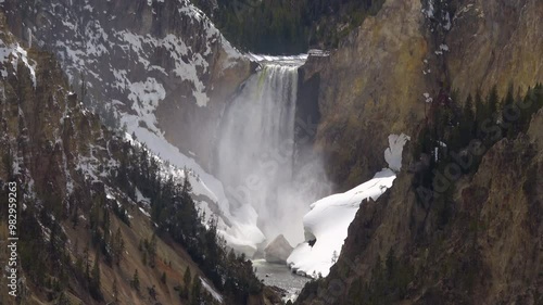 Cinematic shot of scenic landscape at Lower Yellowstone River Falls in Yellowstone National Park, USA
