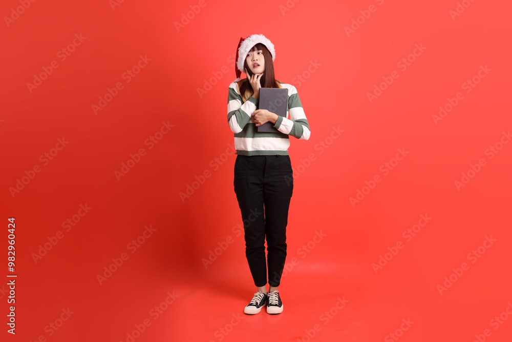 Woman wearing Santa hat Woman wearing Santa hat