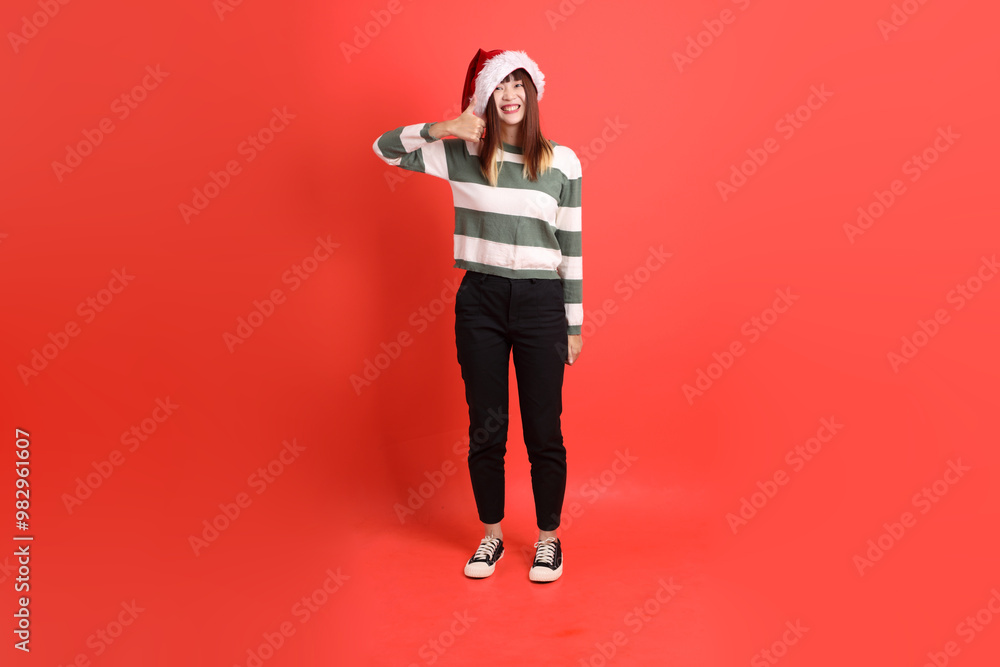 Woman wearing Santa hat Woman wearing Santa hat