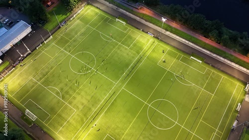 Aerial view of the soccer pitch close to the bridge over the Mourne River in Strabane in Northern Ireland photo