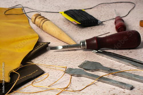 Close-up of a set of leatherworking tools. photo