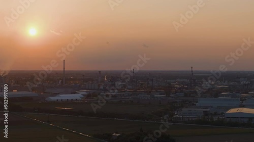 Wallpaper Mural Industrial and port area of Ravenna ,chemical and petrochemical pole,thermoelectric,metallurgical plants and hydrocarbon refinery and liquefied natural gas tanks at sunset Torontodigital.ca
