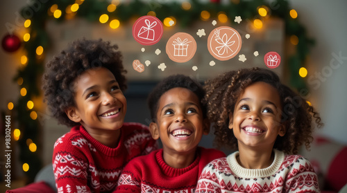 Three children wearing festive sweaters sit together, smiling and dreaming about holiday gifts. The warm atmosphere is enhanced by twinkling lights and decorations