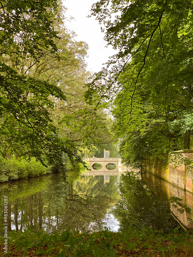 Beautiful view of a bridge over a canal in the park Beautiful view of a bridge over a canal in the park