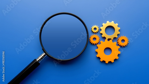 Magnifying glass and gears on blue background representing seo audit and analysis.