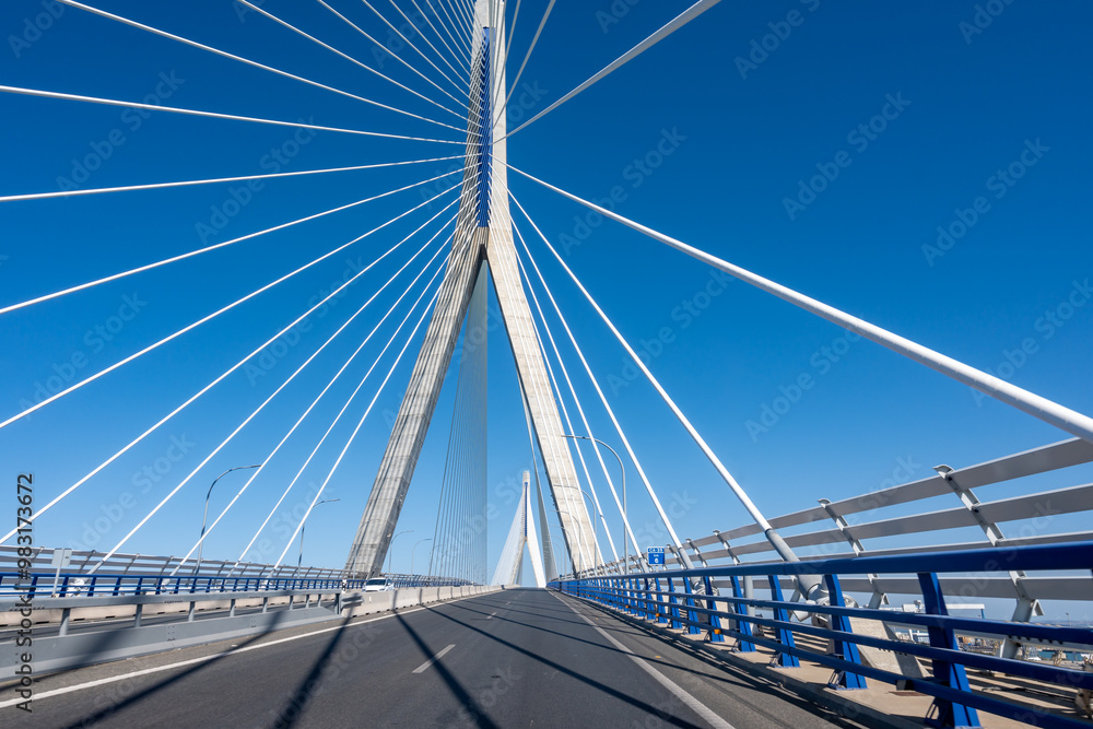 Fototapeta premium View on cable-stayed bridge with high pylons across the Bay of Cadiz, linking Cadiz with Puerto Real in mainland Spain