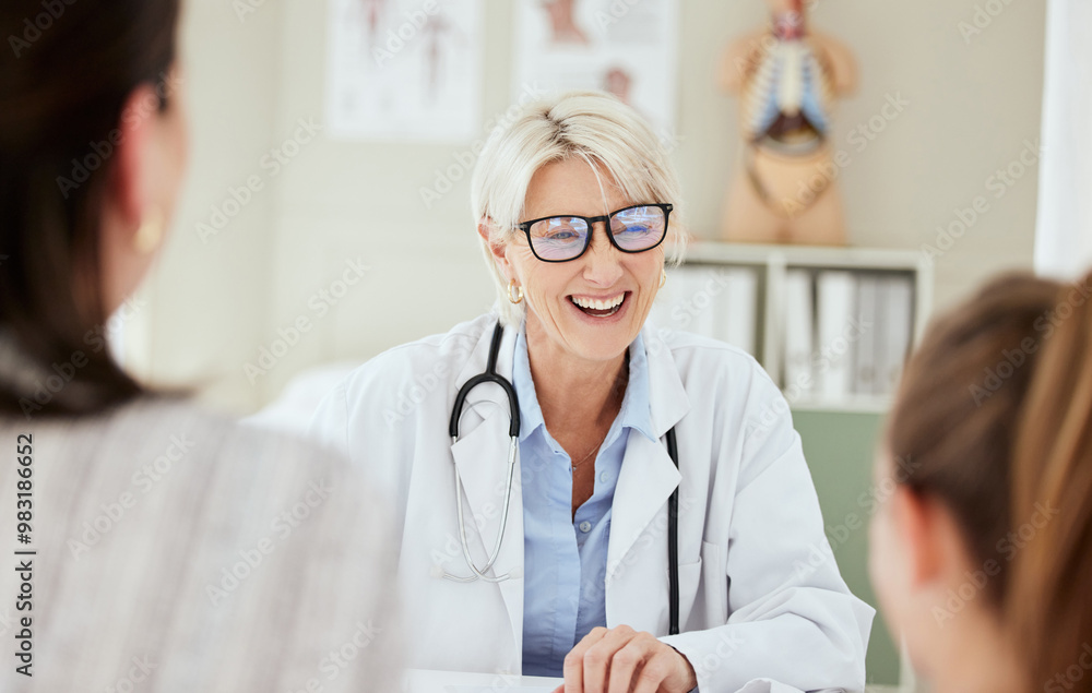 Checkup, doctor and talking to child, laughing and mature woman with glasses, growth and development. Office, mom and diagnosis in appointment and conversation for health of kid and pediatrician Checkup, doctor and talking to child, laughing and mature woman with glasses, growth and development. Office, mom and diagnosis in appointment and conversation for health of kid and pediatrician