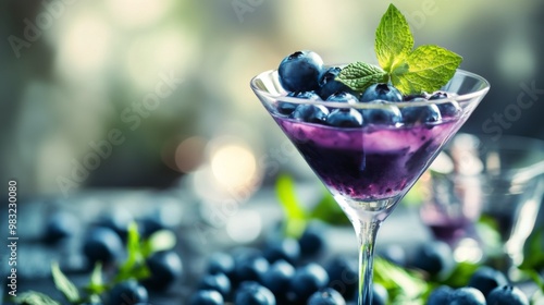Refreshing blueberry mint smoothie served in a glass with fresh ingredients o...