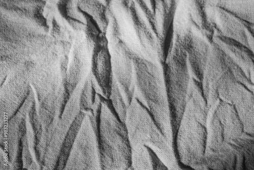 Фотография Wrinkled, crumpled fabric on sunbeam, background, texture
