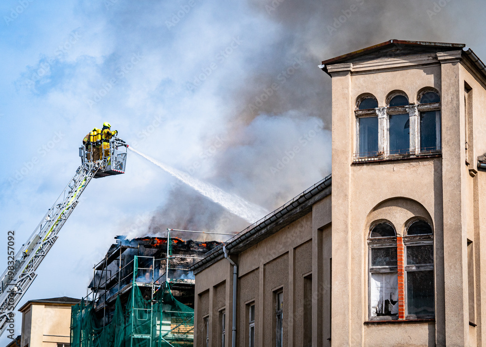 Fototapeta premium Hausbrand löschen