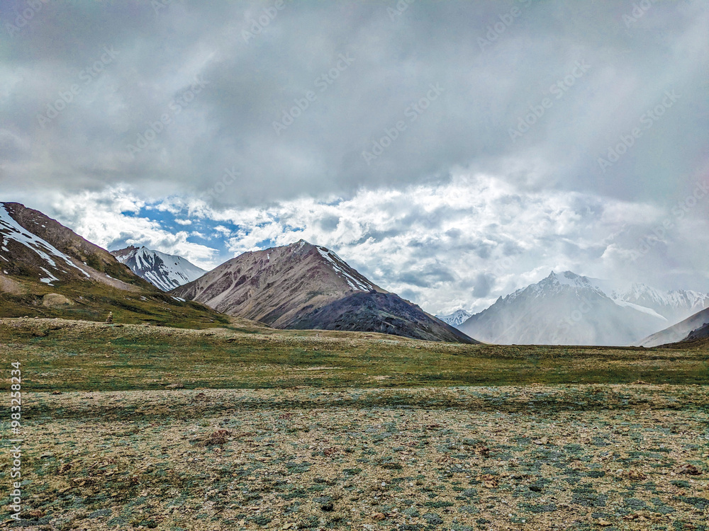 Fototapeta premium Breathtaking Views of Shimshal Pass in the Pamir Mountains. Shimshal Valley is a remote and breathtakingly beautiful area known for its high-altitude landscapes, rugged mountains, and many more.