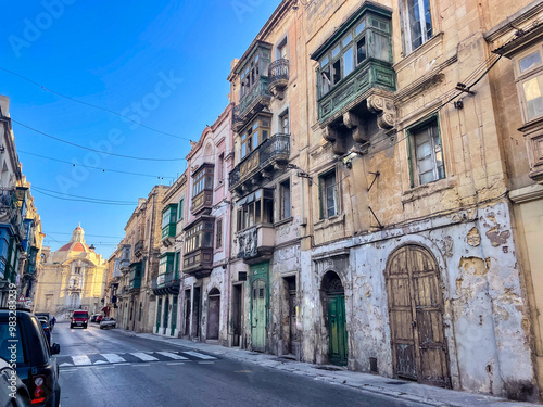 Old buildings facades ruined and damaged in Valletta, Malta Island, Mediterranean Sea