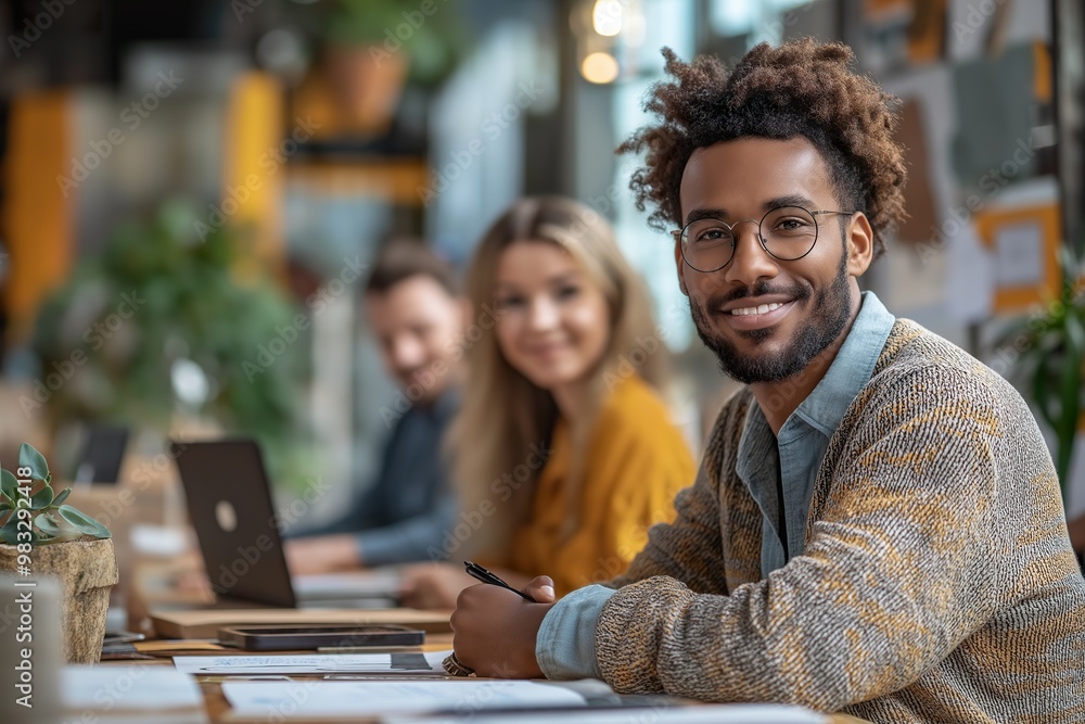 Business meeting with diverse employees collaborating in a modern office setting Business meeting with diverse employees collaborating in a modern office setting