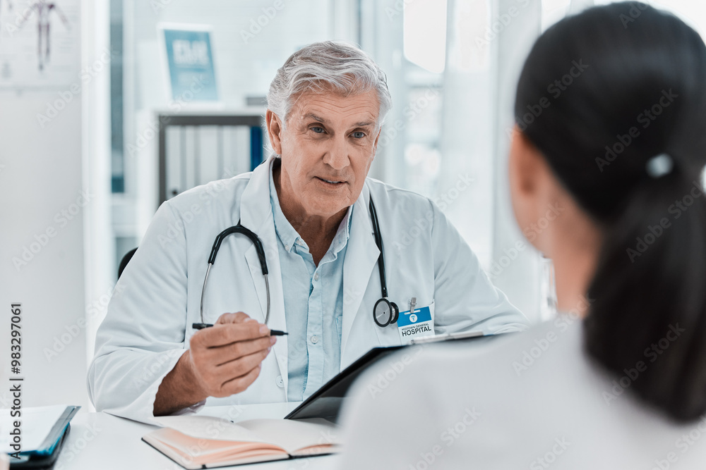 Mature doctor, patient and appointment in office clinic for healthcare, checkup or advice. Medical professional, woman and conversation for help, exam or results on clipboard in hospital consultation Mature doctor, patient and appointment in office clinic for healthcare, checkup or advice. Medical professional, woman and conversation for help, exam or results on clipboard in hospital consultation