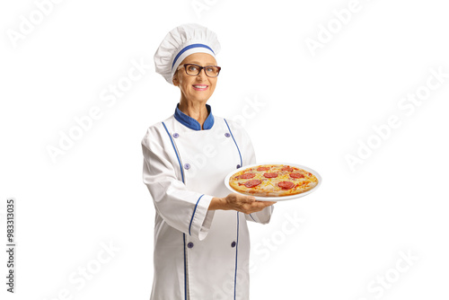 Female chef holding pizza on a plate