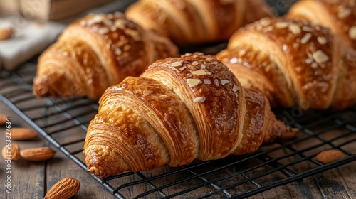 Wallpaper Mural Delectable croissants with almonds on a metal grate
 Torontodigital.ca