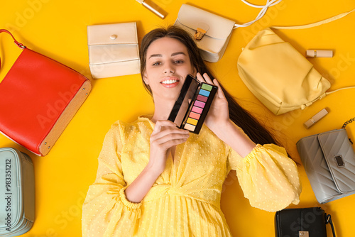 Happy smiling young woman w...