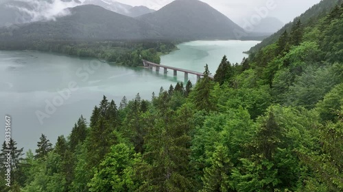 Aerial footage of the Sylvenstein Reservoir in the Isar valley, Upper Bavaria, Germany photo