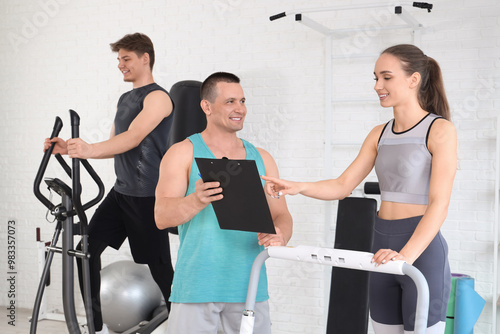 Male trainer with clipboard...