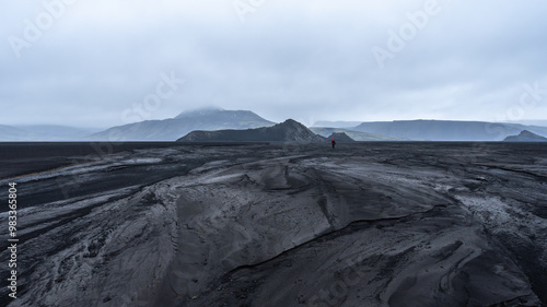 Moody Icelandic highlands with solitary figure