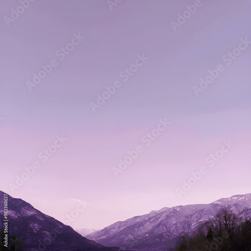 Whispers of Twilight: Mountains Beneath a Light Purple Sky