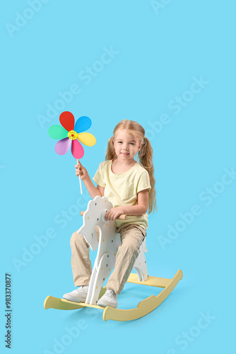 Cute little girl with toy w...