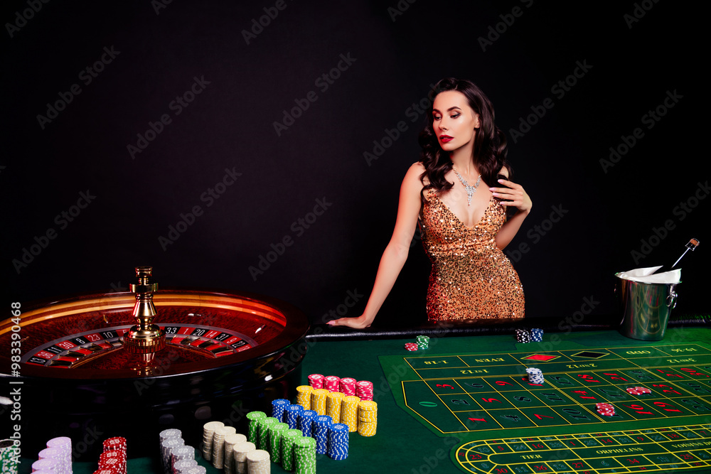 Photo of serious young lady touching hair when predict spinning roulette number in blackjack game over dark background Photo of serious young lady touching hair when predict spinning roulette number in blackjack game over dark background