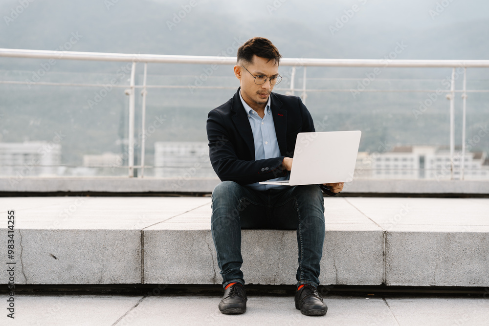 Businessman Working on Rooftop Laptop Businessman Working on Rooftop Laptop