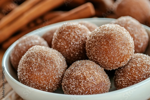 Close-up of Brown Sugar Coated Dough Balls in a White Bowl photo