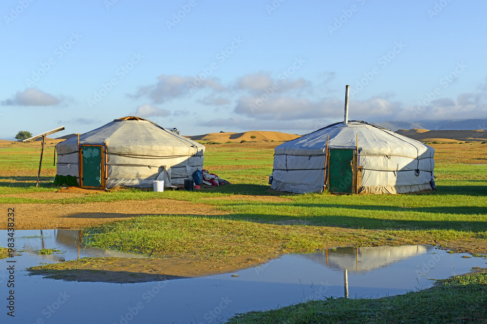 A yurt or ger is a portable, round tent covered and insulated with skins or felt and traditionally used as a dwelling, Mongolia