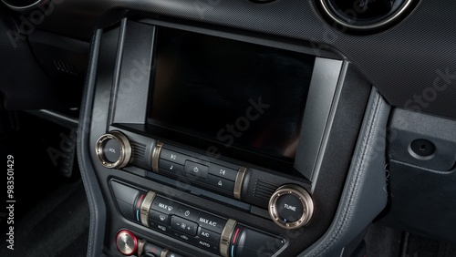 Screen and climate controls on a car