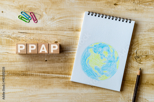 There is wood cube with the word PPAP. It is an abbreviation for PPAP as eye-catching image. photo