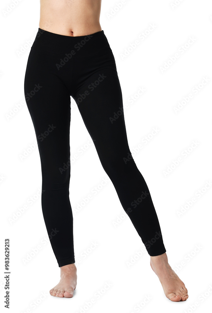 Woman wearing black sports leggings on white background, closeup Woman wearing black sports leggings on white background, closeup